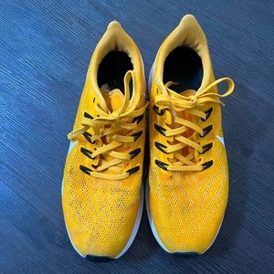 Gold/Yellow Nike running shoes